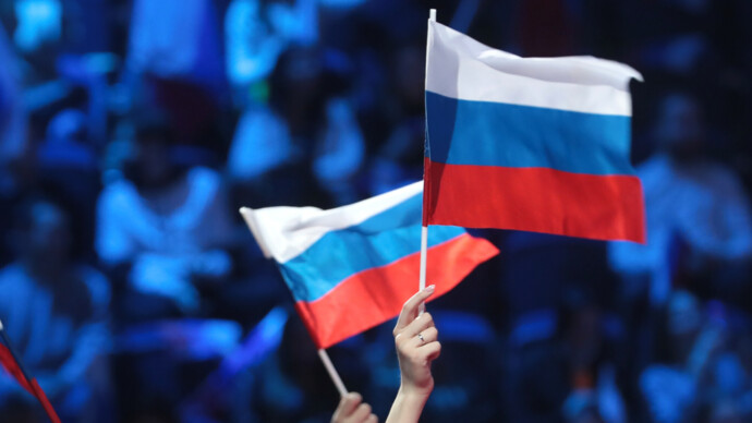 Американец вернул флаг России в международный спорт. Откуда взялся этот смельчак?